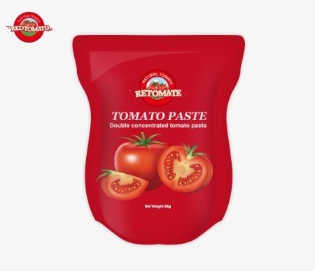 Stand-up zak met 56 g dubbel geconcentreerde tomatenpasta met een zuiverheid van 28% tot 100%