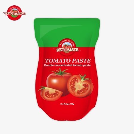 140 g stand-up zakje van zoete en zure tomatenpasta, verkrijgbaar in 22% tot 30% zuiverheid