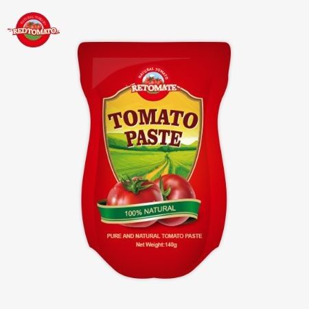 140 g stand-up zakje van zoete en zure tomatenpasta, verkrijgbaar in zuiverheidsniveaus van 22% tot 30%