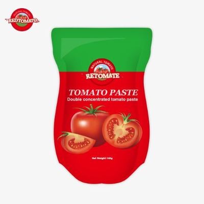 140 g stand-up zakje van zoete en zure tomatenpasta, verkrijgbaar in 22% tot 30% zuiverheid