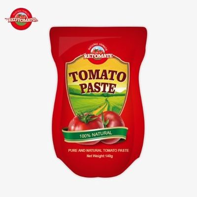 140 g stand-up zakje van zoete en zure tomatenpasta, verkrijgbaar in zuiverheidsniveaus van 22% tot 30%
